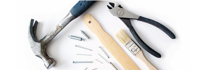 Hammer, pliers and nails
